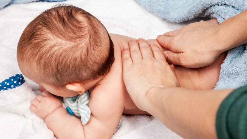 Parent and child at a first pediatric chiropractic visit in Haddonfield, NJ